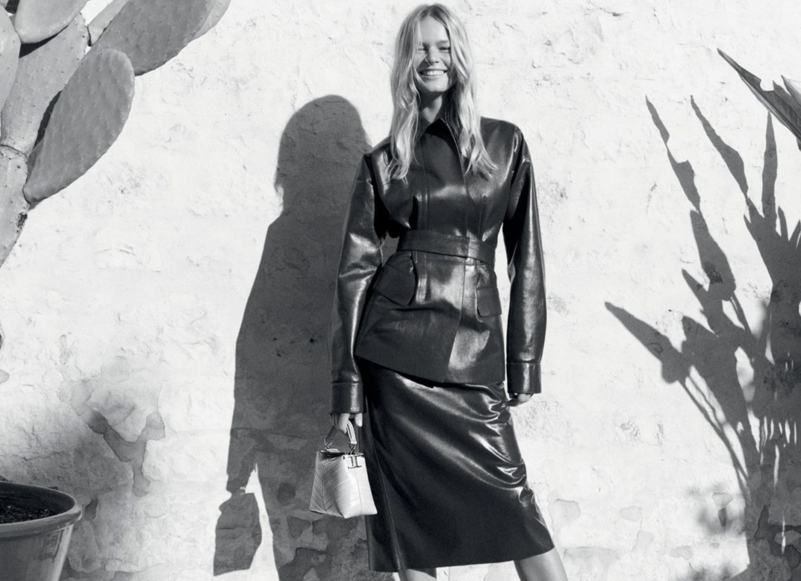 Tod's ad campaign featuring a model standing against a blank wall